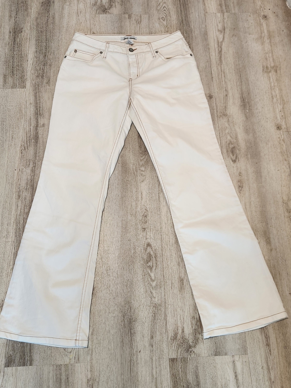 CAbi White Wide-Leg Flare Jeans With Embossed Pockets